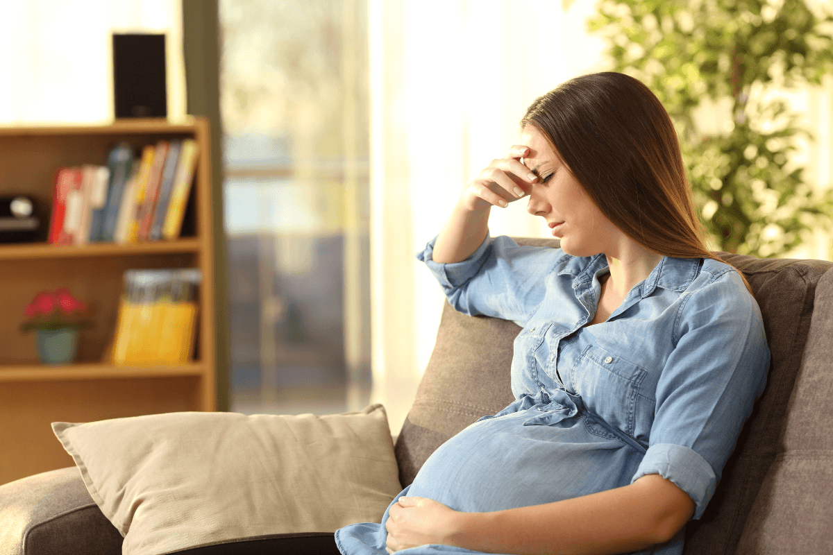 Pregnant woman feeling overwhelmed