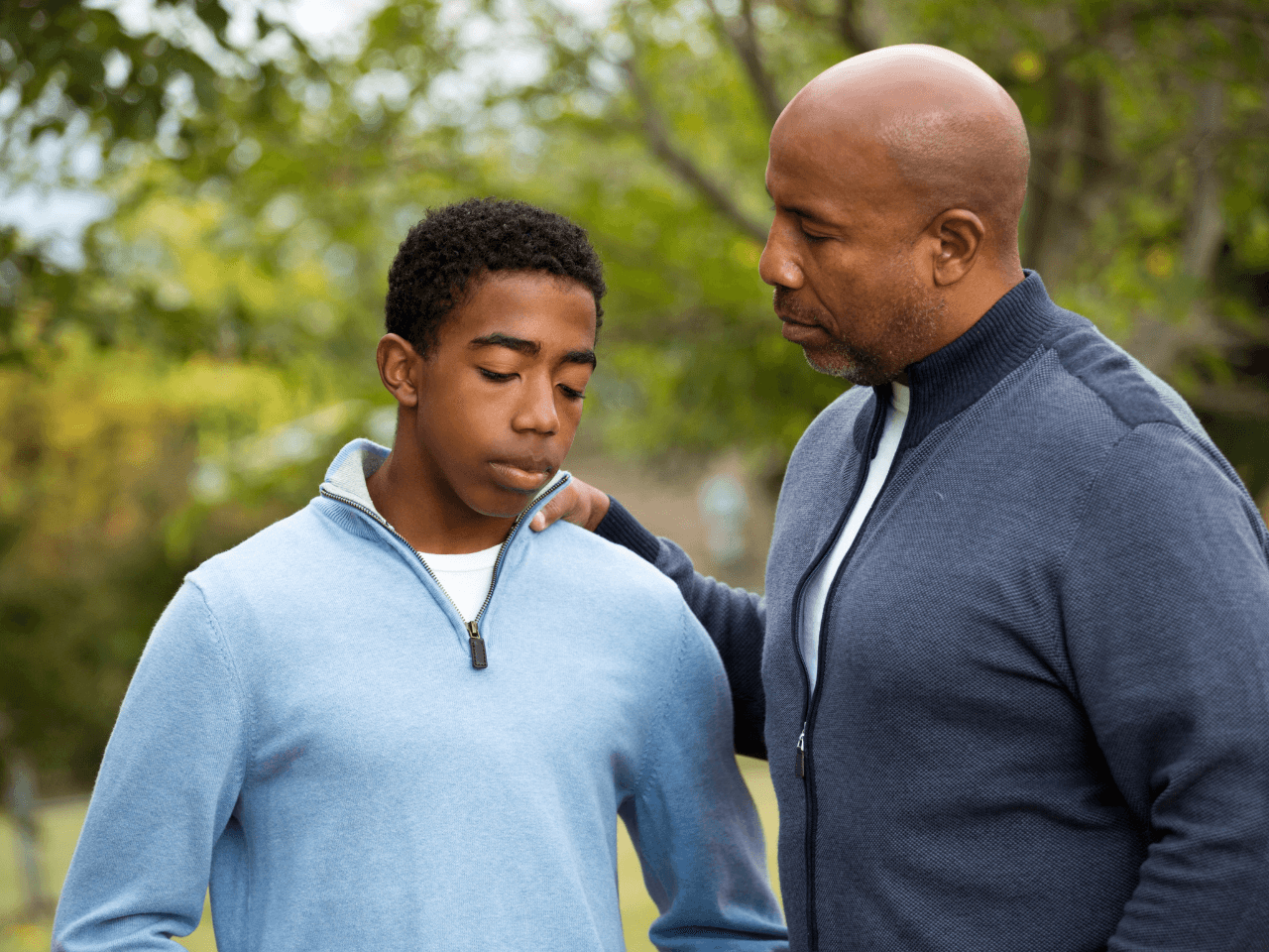 Father speaking to son.png