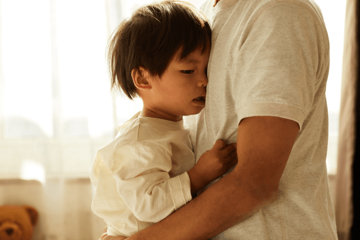 Child hugging their parent