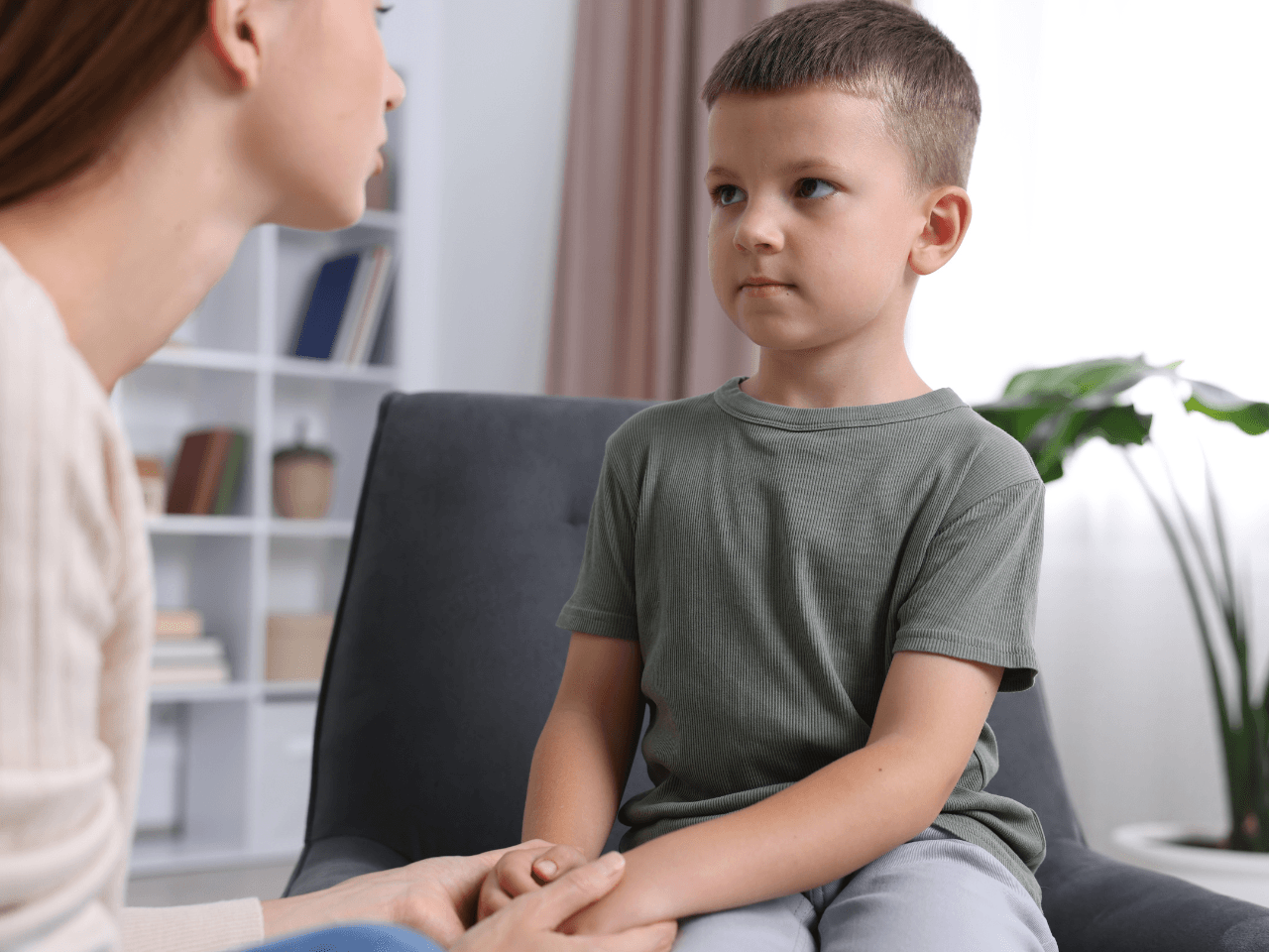 Mother talking to son.png